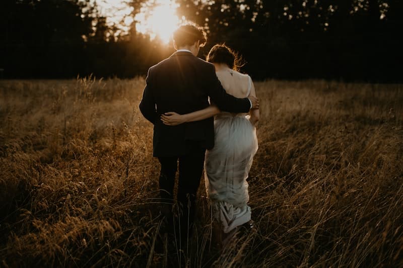 Couple embracing at golden hour